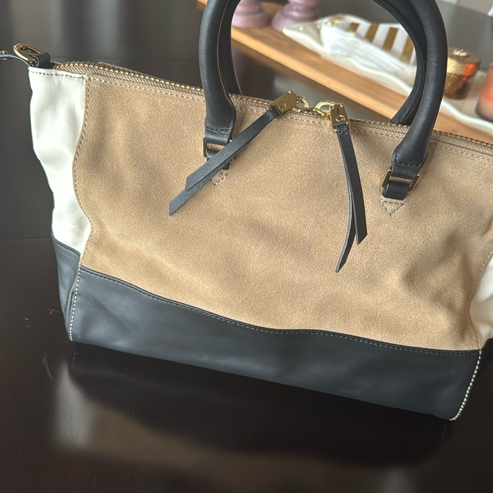 C. Wonder leather and suede purse bag with black strap